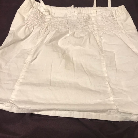 White shirt with buttons. - Picture 1 of 4